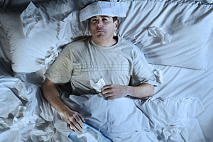 man-bed-flu-sick