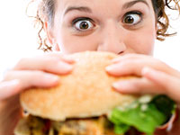 woman-eating-burger