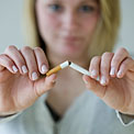 hands-breaking-cigarette