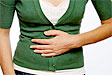 hand-stomach-nausea