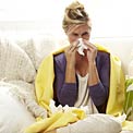 woman-blowing-nose