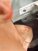 breast-squeezed-mammogram