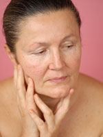 woman-thinking-implants-cancer
