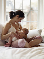 Women+breastfeeding+baby