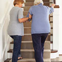 women-stairs-senior-care-relative