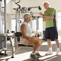 senior-men-lifting-weights-in-gym