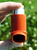 asthma-inhaler-hand