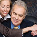 woman-huging-man-signing