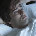 man-awake-bed-stress