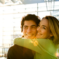 couple-airport-happy