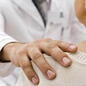 doc-hand-patient-cancer