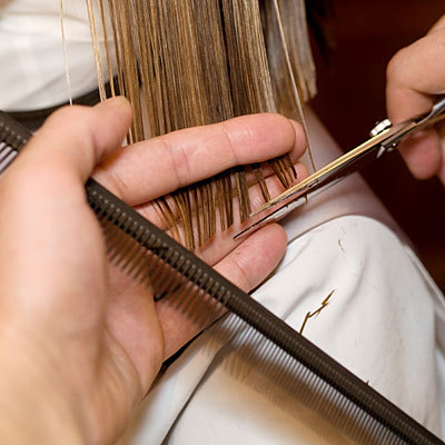 girl-haircut-scissors