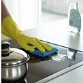 woman-cleaning-stove