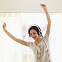 woman-headphones-dancing-