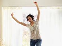 woman-headphones-dancing-