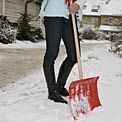 woman-shoveling-snow