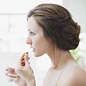 woman-taking-tylenol