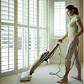 woman-vacuuming-house