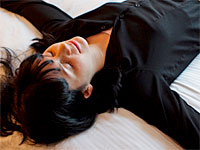 woman-bed-smile