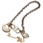 Sterling-silver bracelet with silver charms and 18kt-gold chain, Jeanine Payer.