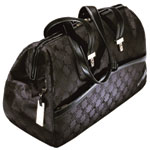 Waterproof polyester-and-nylon Signature Weekender (also in Pomegranate and Coffee), Tumi.