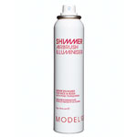 Tiny light-reflecting pigments in this frangipani-scented spray give a luminous sheen to arms, legs, shoulders and back. It lasts for hours, doesn?t rub off, and contains vitamin E to moisturize skin., Modelco.
