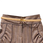 Embossed leather belt ($32) and gold-tone buckle ($19), Terry Stack.