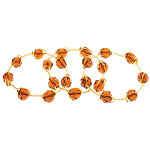 Brass-wire bracelets with topaz-colored glass beads, Louie Louie.