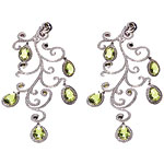 Earrings of peridot and diamonds set in 18kt gold, Chopard.