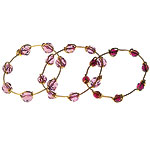 Crystal and gold-tone bangles, Louie Louie.