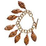 22kt-gold bracelet with antique Chinese nut charms, Cathy Waterman.