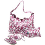Cotton waffle bag ($38) and spa slippers with shoe bag ($38) in violet, also in teal and indigo, John Robshaw Textiles.