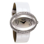 White gold and diamonds with alligator strap, Piaget.