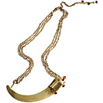 Resin-tusk necklace on gold-plated chain with garnet-colored crystals, Elizabeth Cole Jewelry.