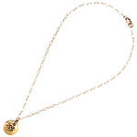 Om pendant in 24kt-gold vermeil with Swarovski crystal, Rachel Abroms.