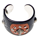 Leather cuff with brass studs on stingray, Helene Zubeldia.