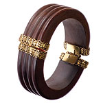 Wood with 24kt-gold vermeil bracelet, Erickson Beamon.