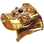 22kt-gold cuff with diamonds and precious stones, Nancey Chapman.
