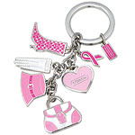 Key chain with charms; Twenty percent of sales from this Coach key chain of silver metal and enamel will go to the BCRF-Breast Cancer Research Foundation, Coach.