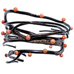Bracelet of 18kt gold and Bahamian wood branch with coral beads and diamonds, Taffin.