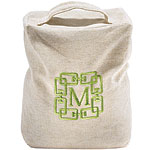 Sand-filled cotton-canvas door stop with green or chocolate monogram, Monogram Market.