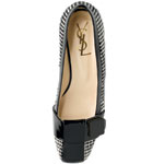 Tweed with patent leather flats, Yves Saint Laurent.