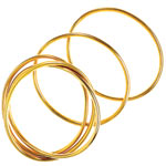 18kt gold bracelets, Julie Sandlau.