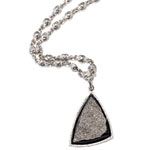 Druzy stone pendant set in pavé-diamond bezel with 18kt-gold link chain and diamond clasp necklace, Loree Rodkin.