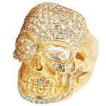Giant skull ring in 18kt gold and diamonds, Loree Rodkin.