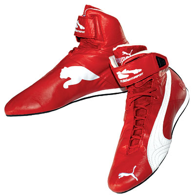 Red color puma shoes athletic