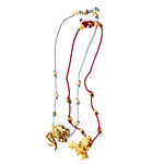 Gold-plated charm on nylon bracelet, Gara Danielle.