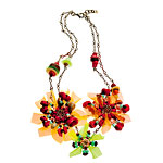 Necklace of brass, seashells, coral, wood, PVC and Swarovski crystals, Chlo.