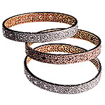 Bangles of diamonds, brown diamonds and platinum, Neil Lane Jewelry.
