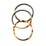 Three bracelets of gold plate, brass and suede, Sibilia.